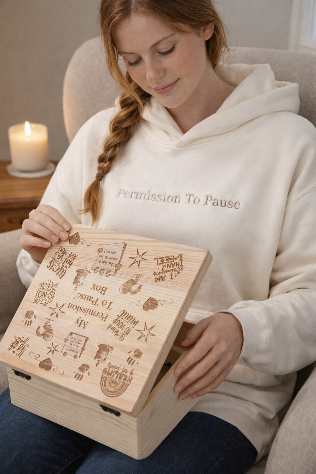 Woman opening a My Permission to Pause wooden box