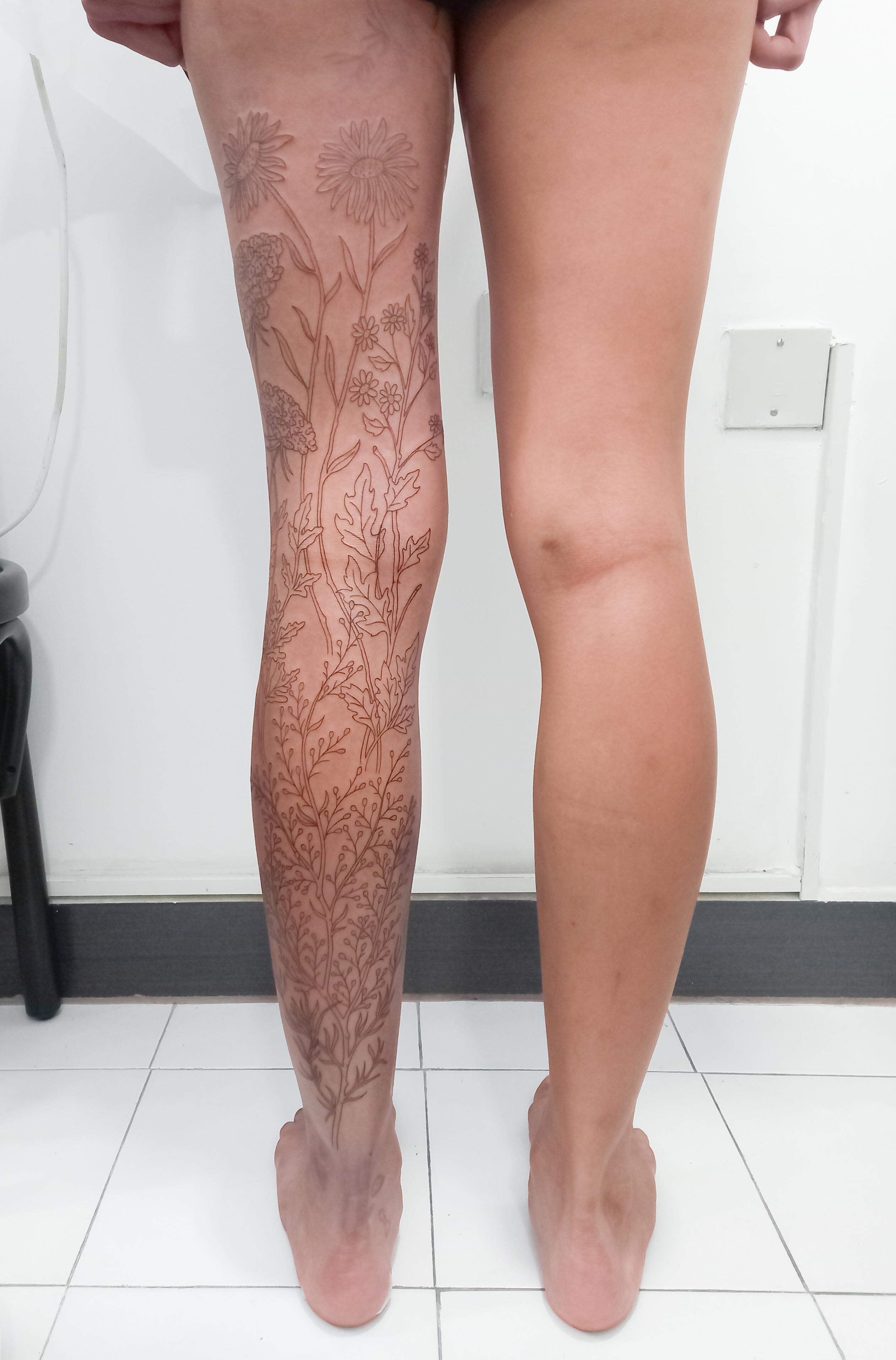 Wildflower full leg sleeve linework tattoo by Tori Talio