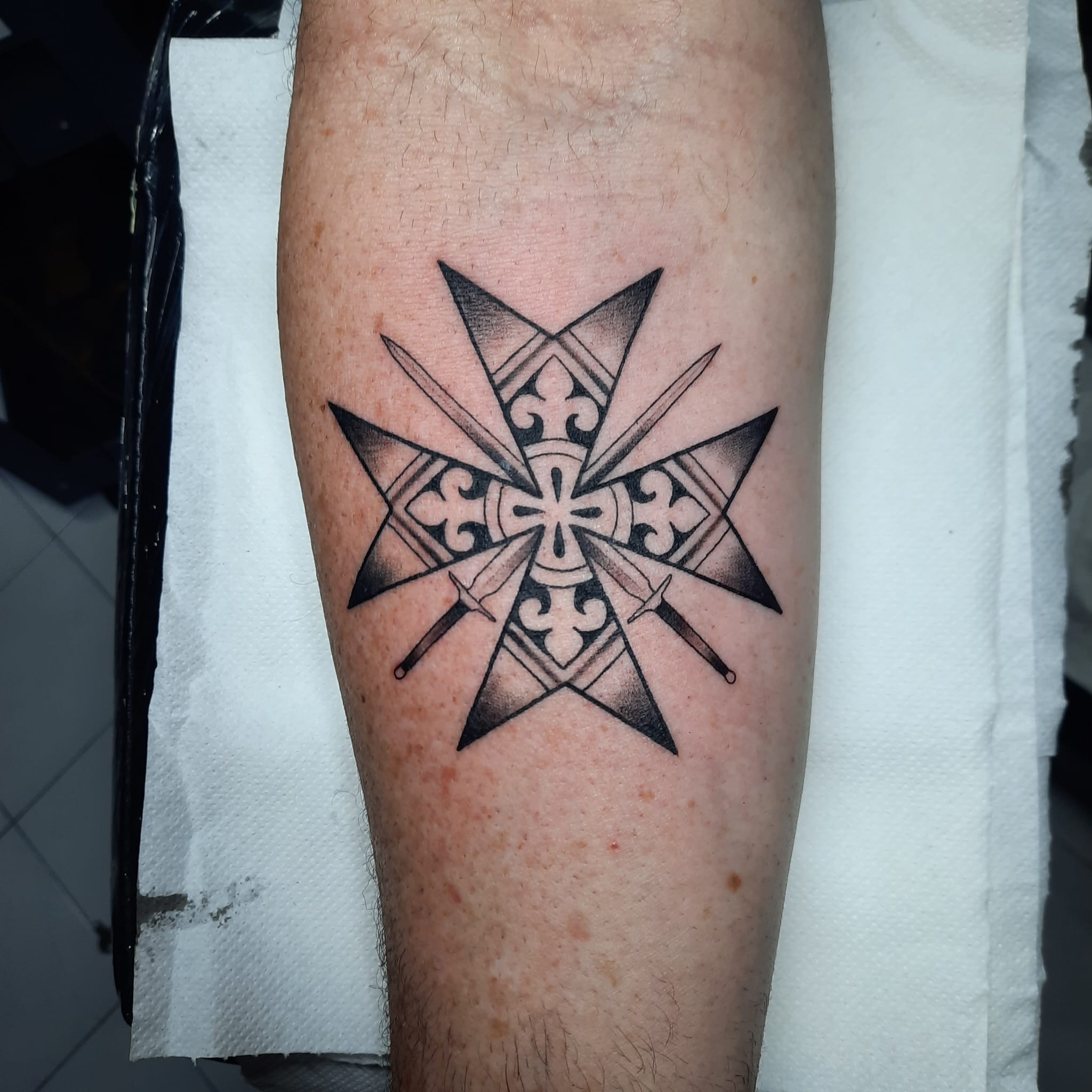 Maltese cross with swords tattoo by Luca Falzon