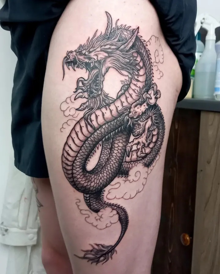 Japanese dragon with clouds thigh tattoo by Tori Talio