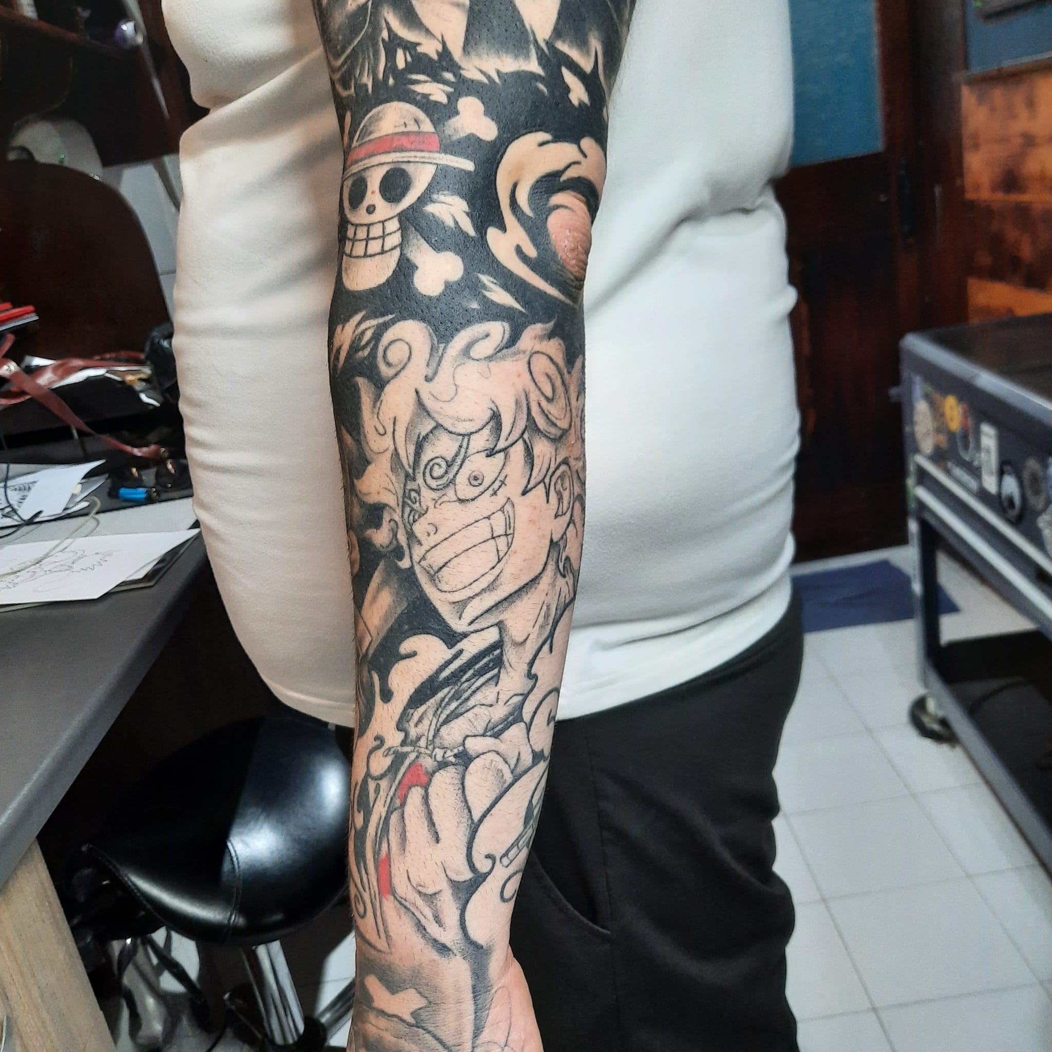 One Piece Luffy Gear 5 sleeve tattoo by Luca Falzon