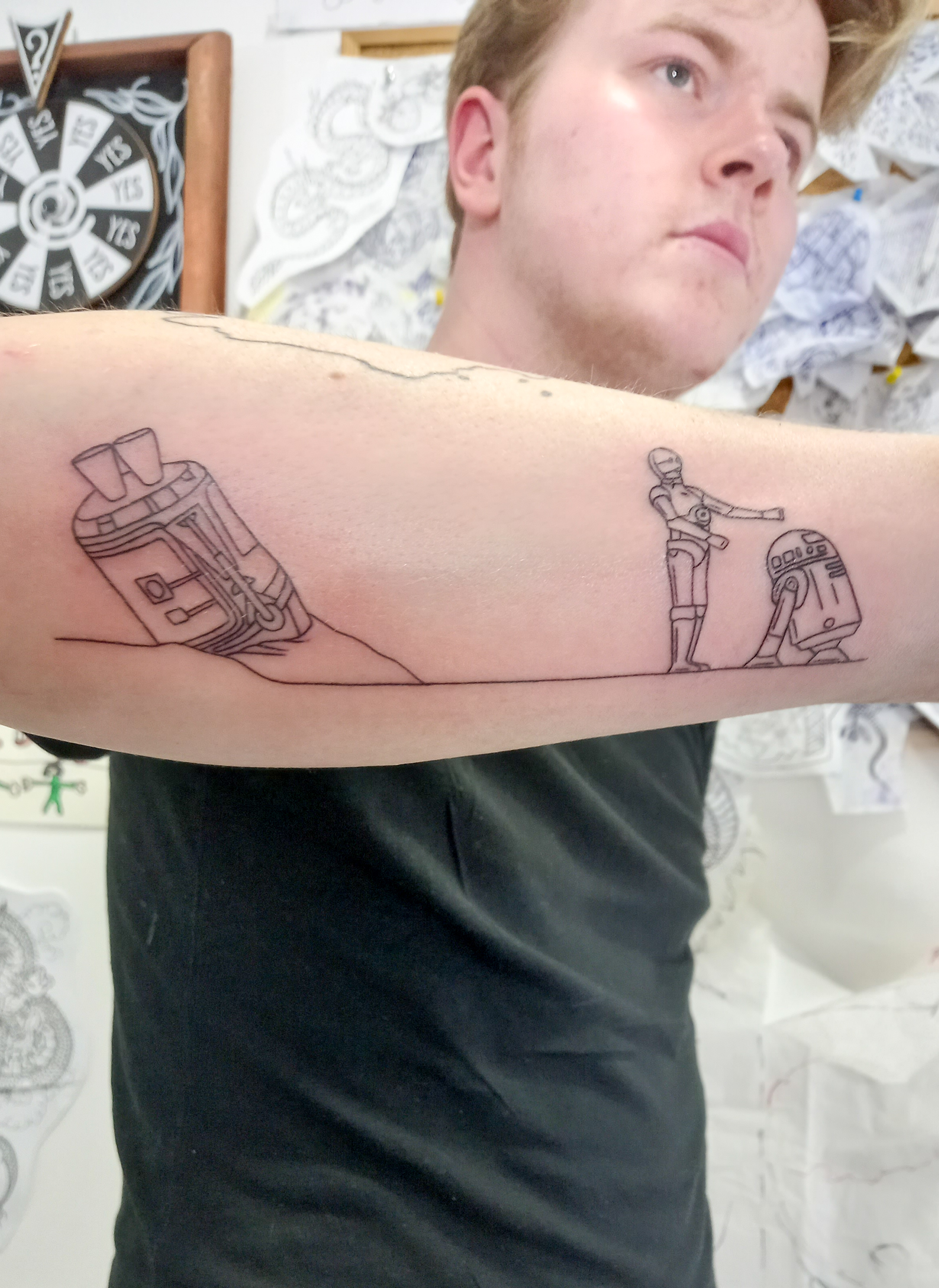 Star Wars C-3PO and R2-D2 desert scene fine line forearm tattoo by Tori Talio