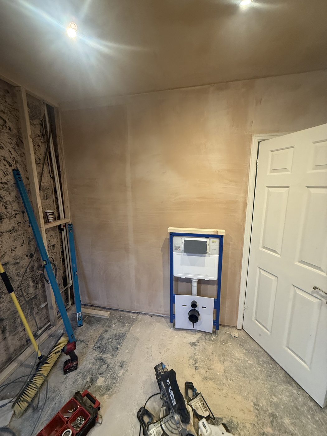 Wall-hung toilet frame installed