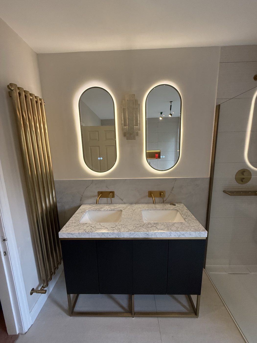 Luxury bathroom installation Stoke-on-Trent — double vanity with gold fixtures