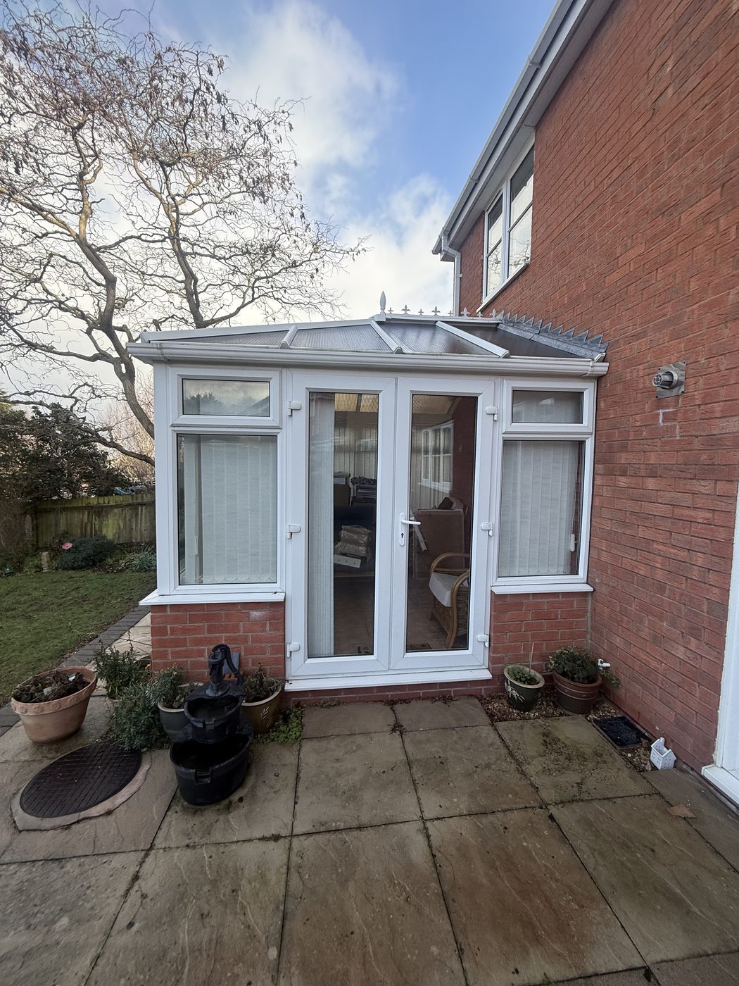 Original UPVC conservatory — polycarbonate roof