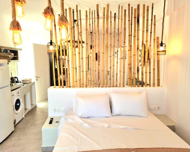 Beautiful bamboo bedroom with rope lights at Joannes Vacation Rooms