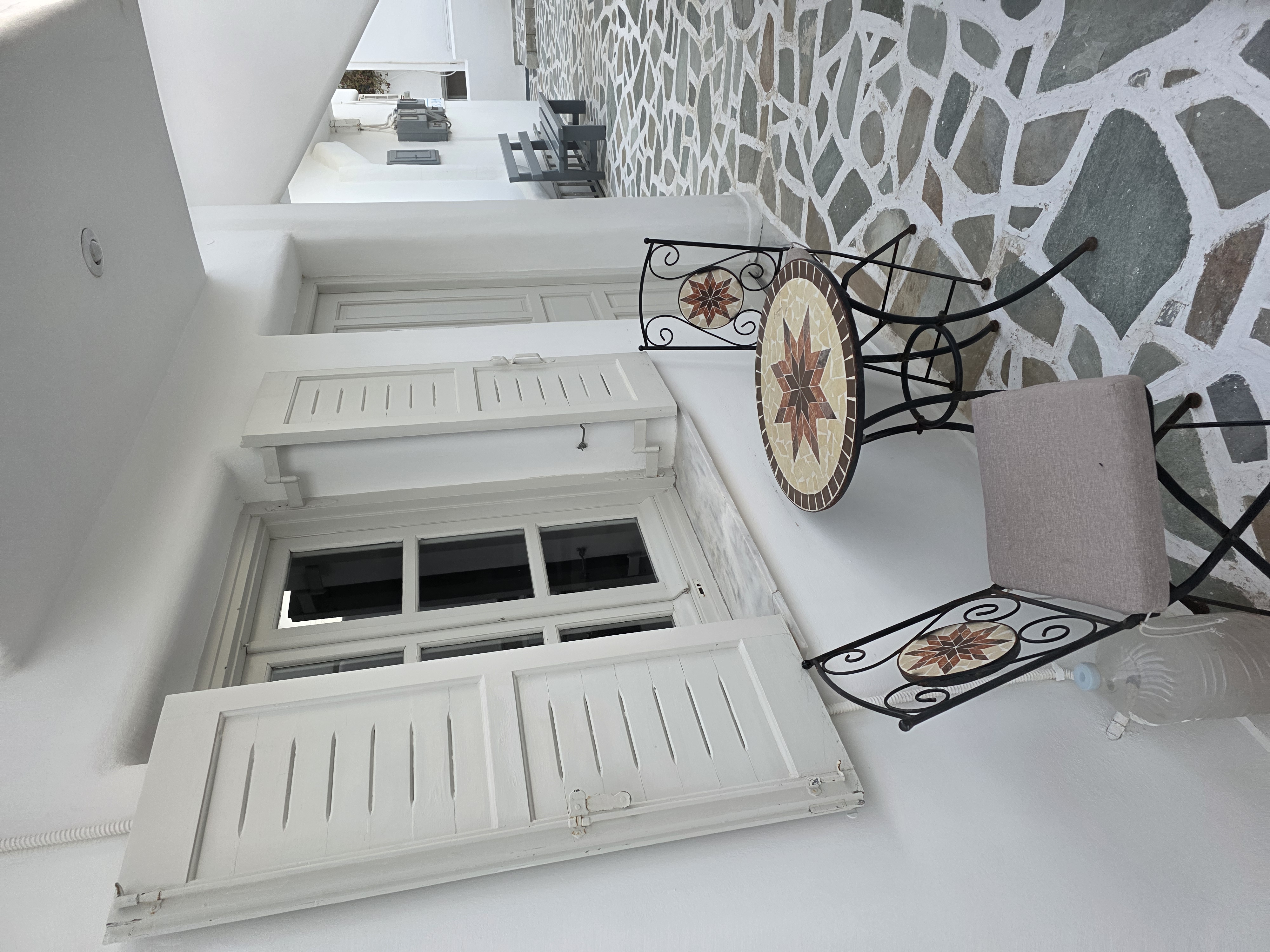 Charming patio seating area at Joannes Vacation Rooms