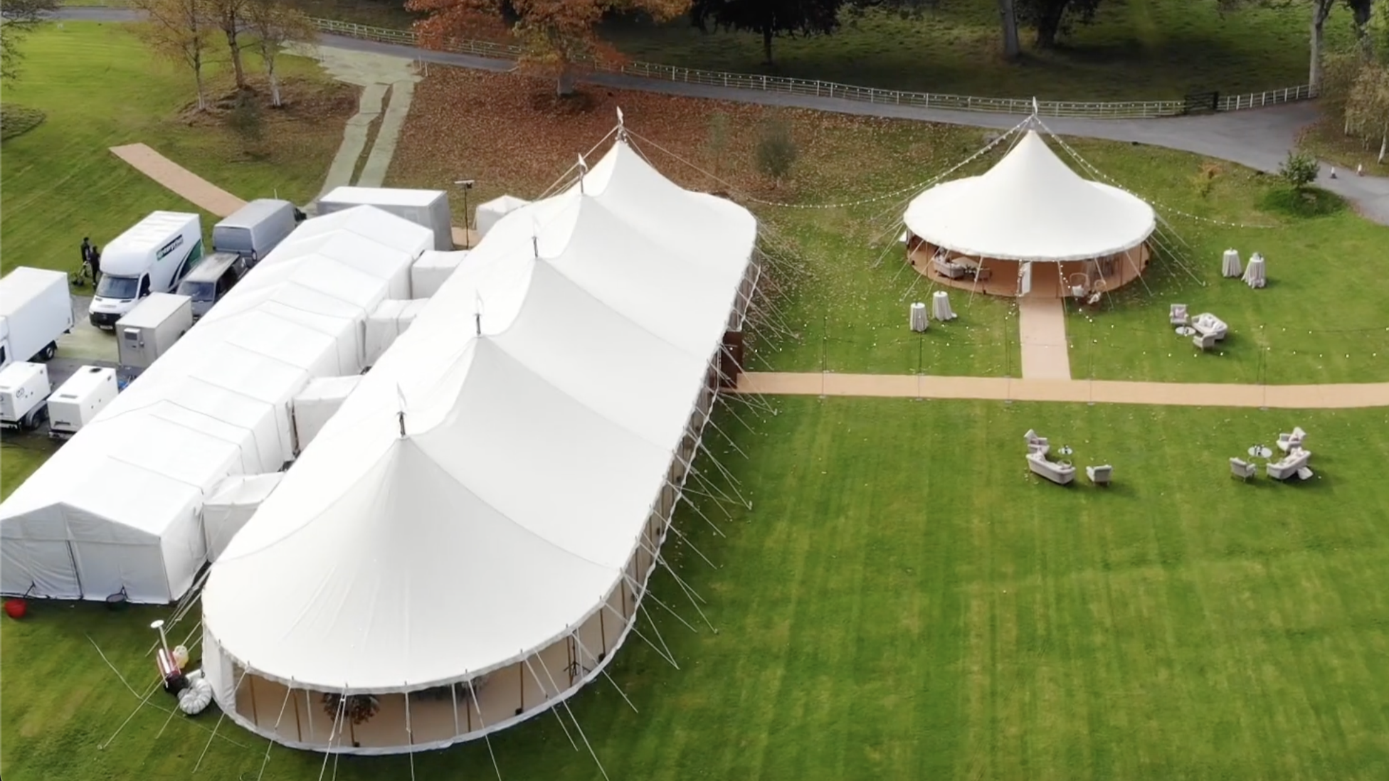 Aerial view of catering tent alongside sailcloth marquee