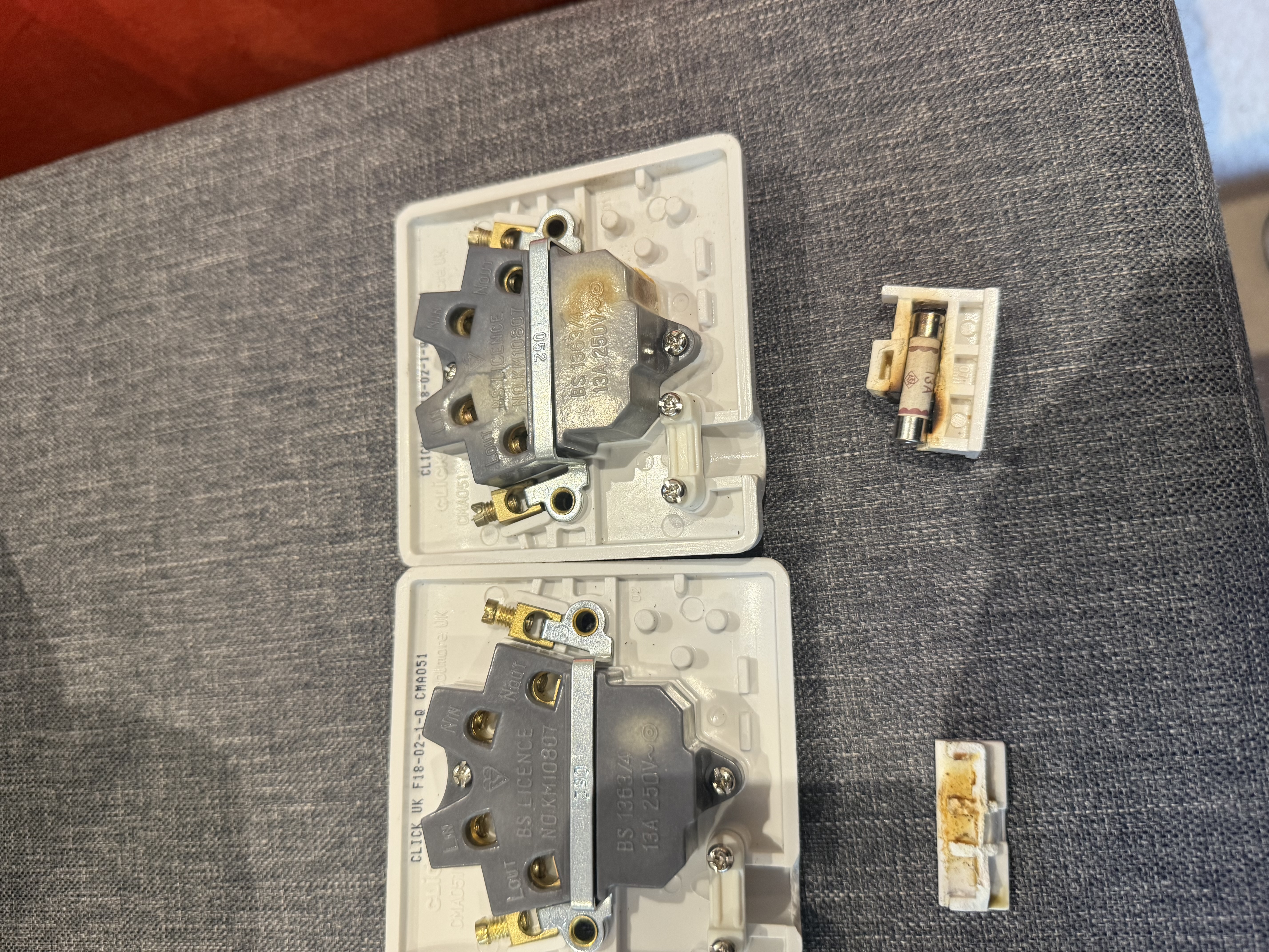 Rear of fused connection unit showing wiring terminals, connections and the back of the socket mechanism
