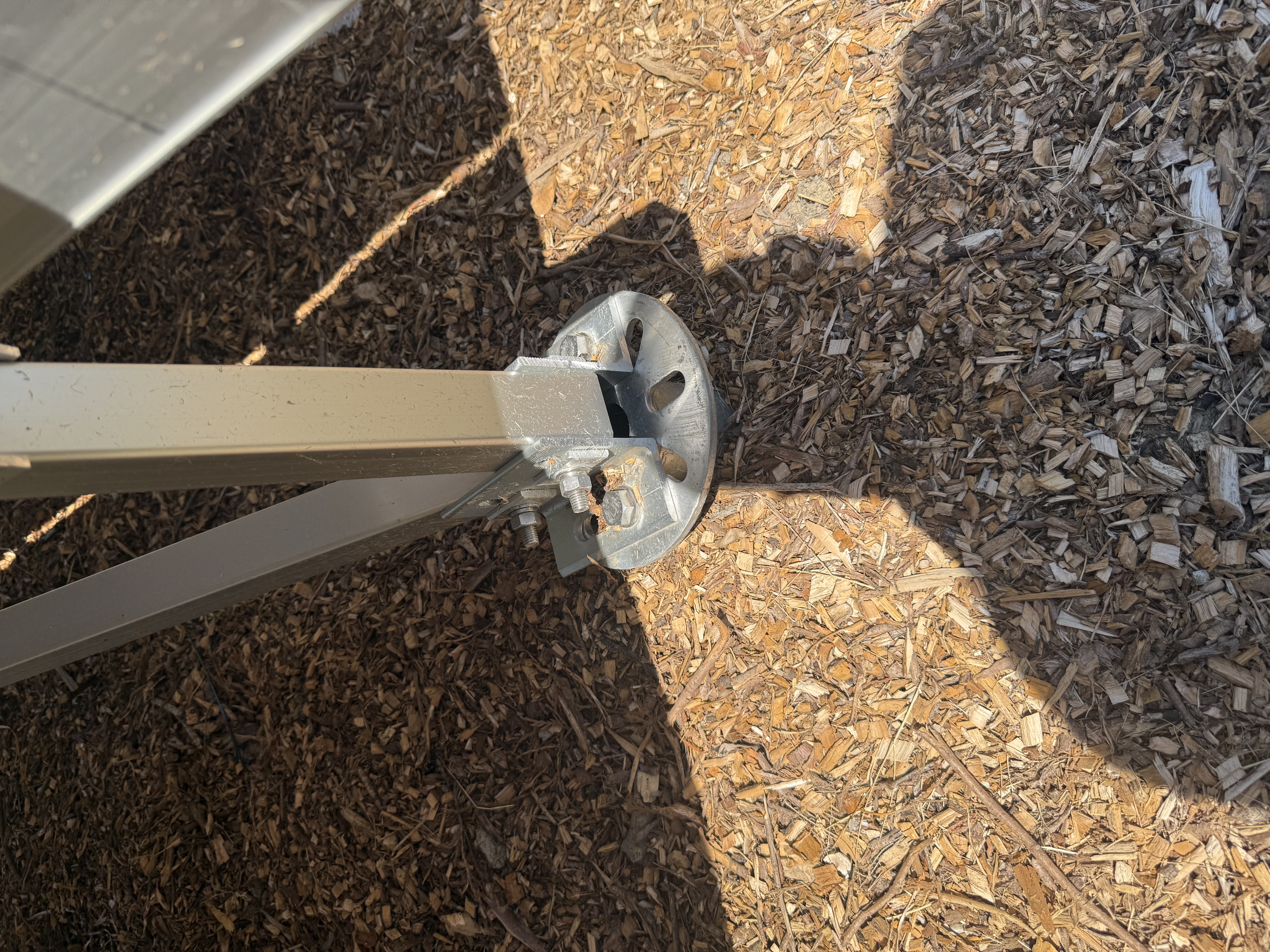 Ground anchor footing detail for ground-mounted solar array in Haywards Heath