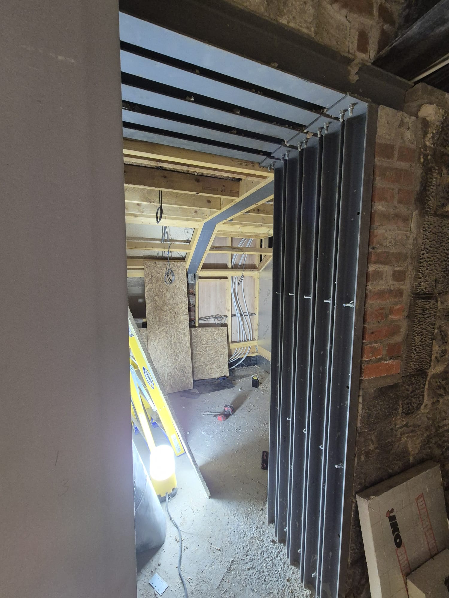 Steel frame doorway into extension