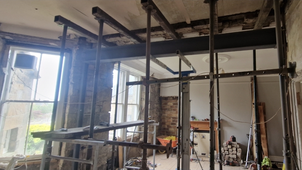 Steel beam installation with acrow props
