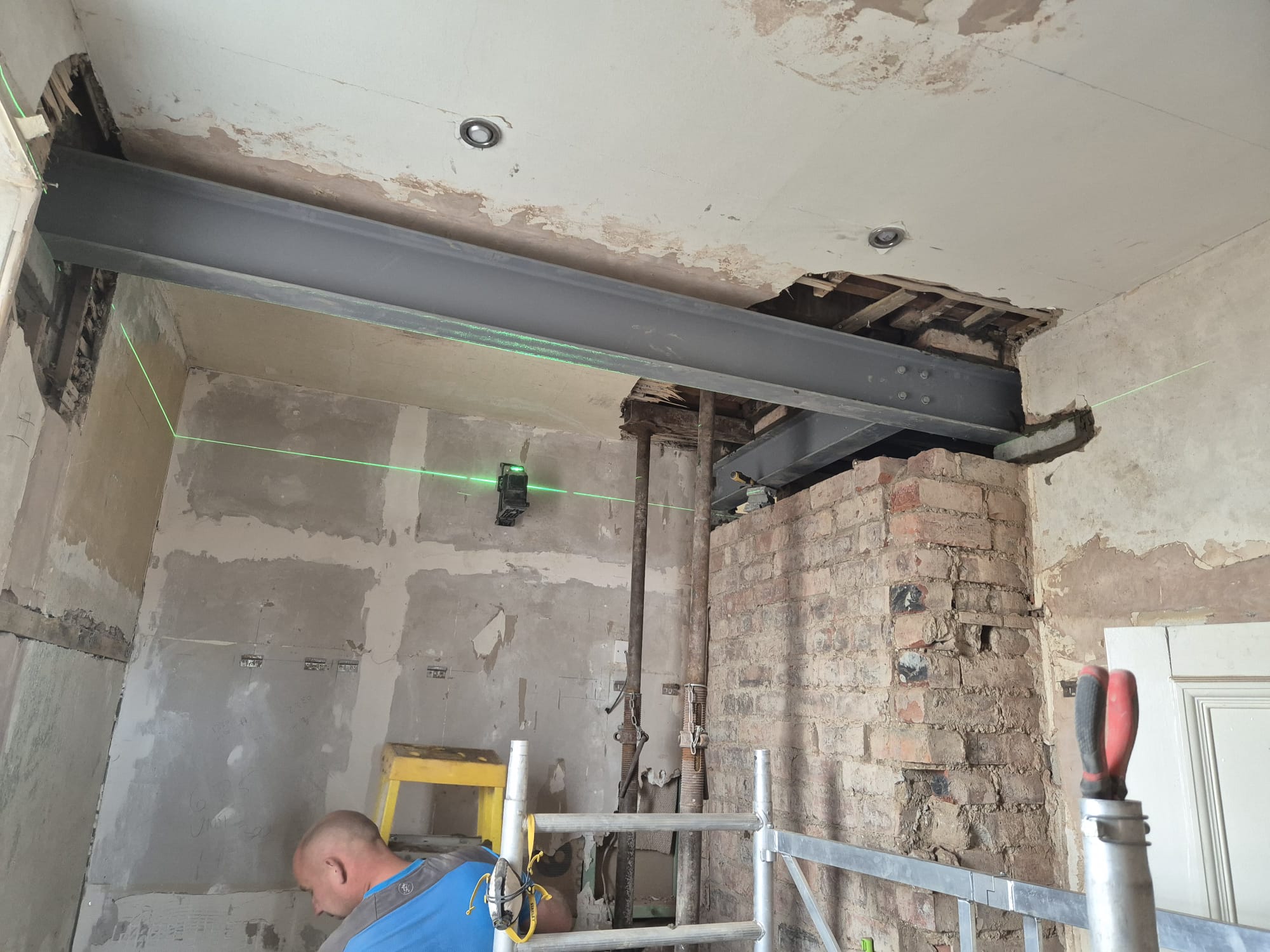 Steel beam installation with laser level