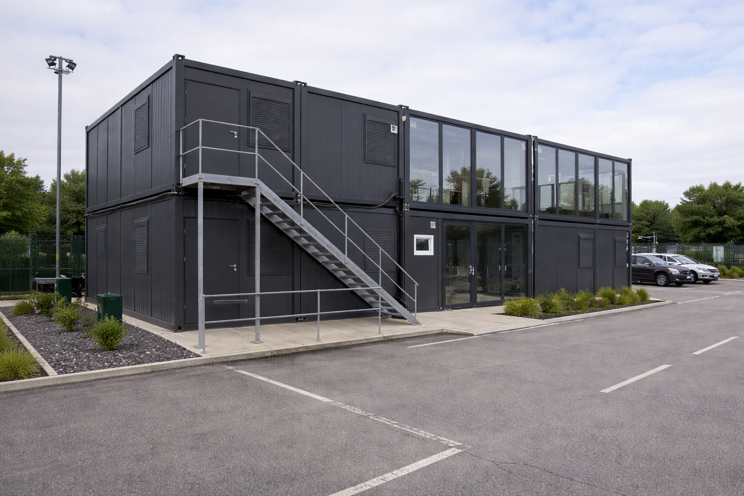 Two-storey modular site office building with external staircase delivered to Campbell Road Lorry Park — KC Modular Buildings