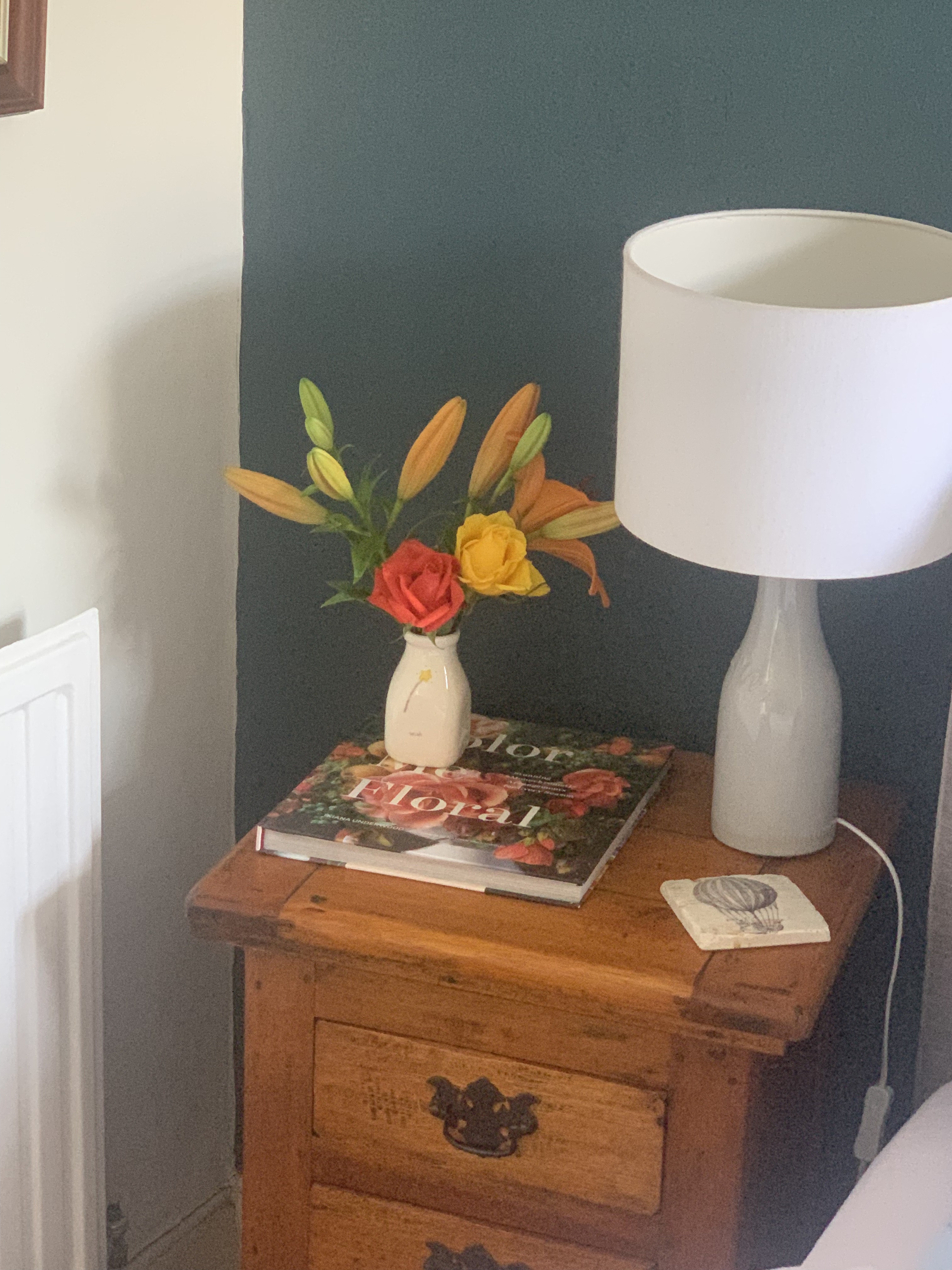 Bedside details with fresh flowers