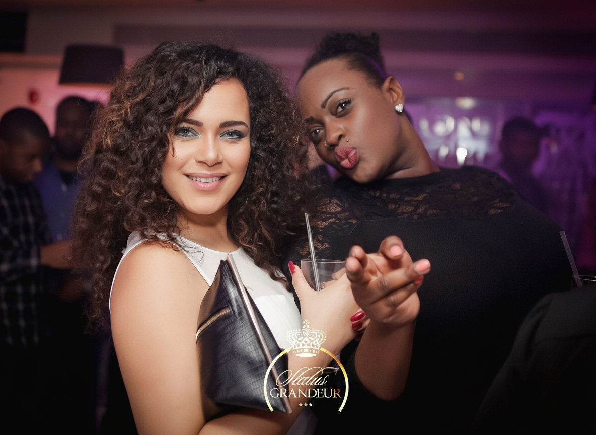 Two women at a Status Grandeur event