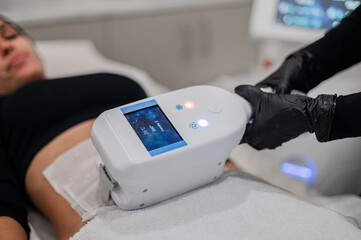 Cryolipolysis fat freezing treatment at aesthetic clinic