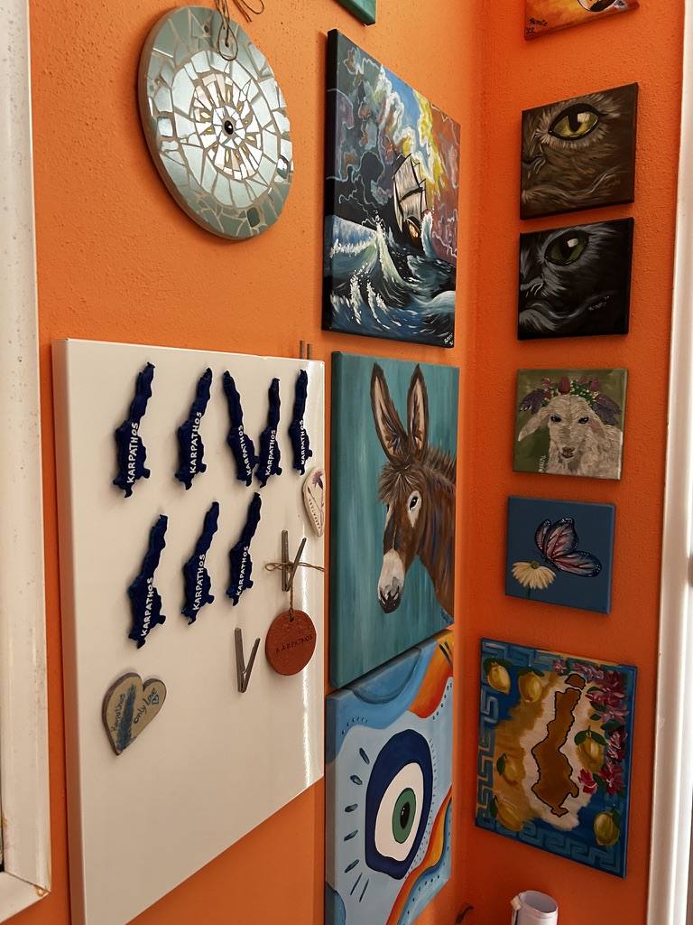 Original paintings, Karpathos island magnets, and handmade art on display