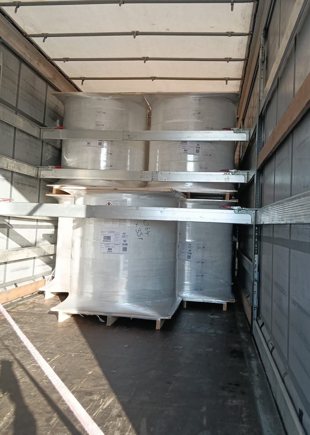 Palletised drums loaded in truck