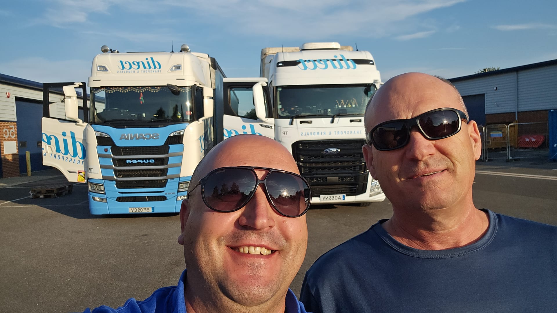 Drivers with trucks at depot