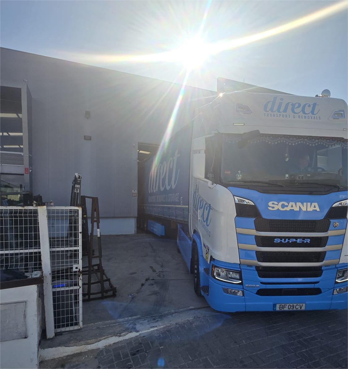 Direct Transport Scania truck at warehouse