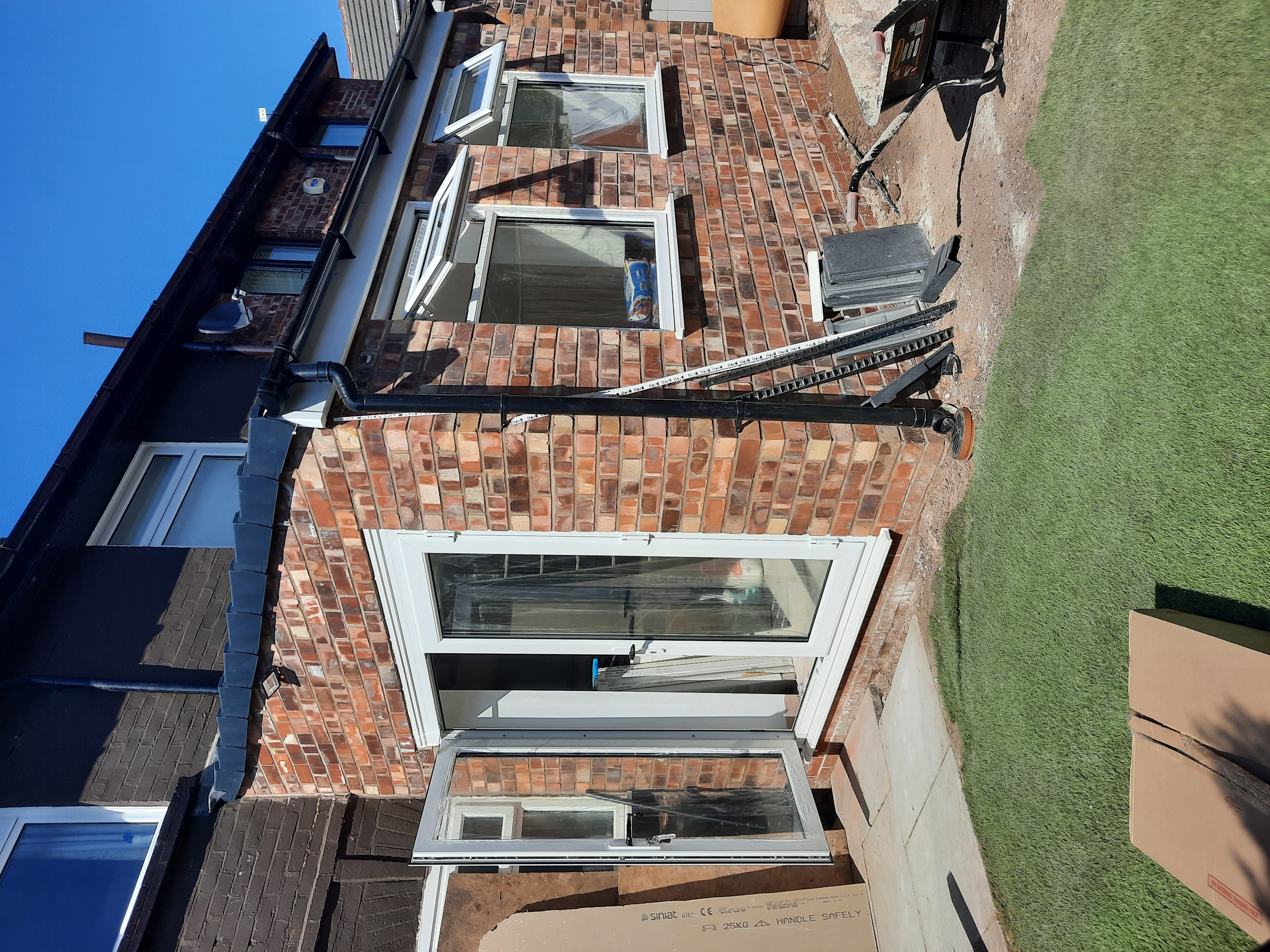 Flat roof rear extension under construction β North West
