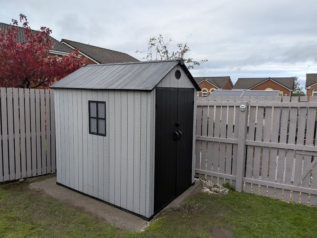 Grey and black garden shed installation by Woodgate Joinery Glasgow