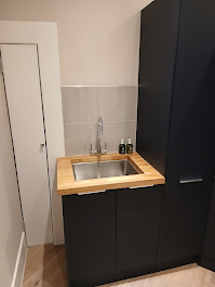 Dark kitchen units oak worktop sink by Woodgate Joinery Glasgow