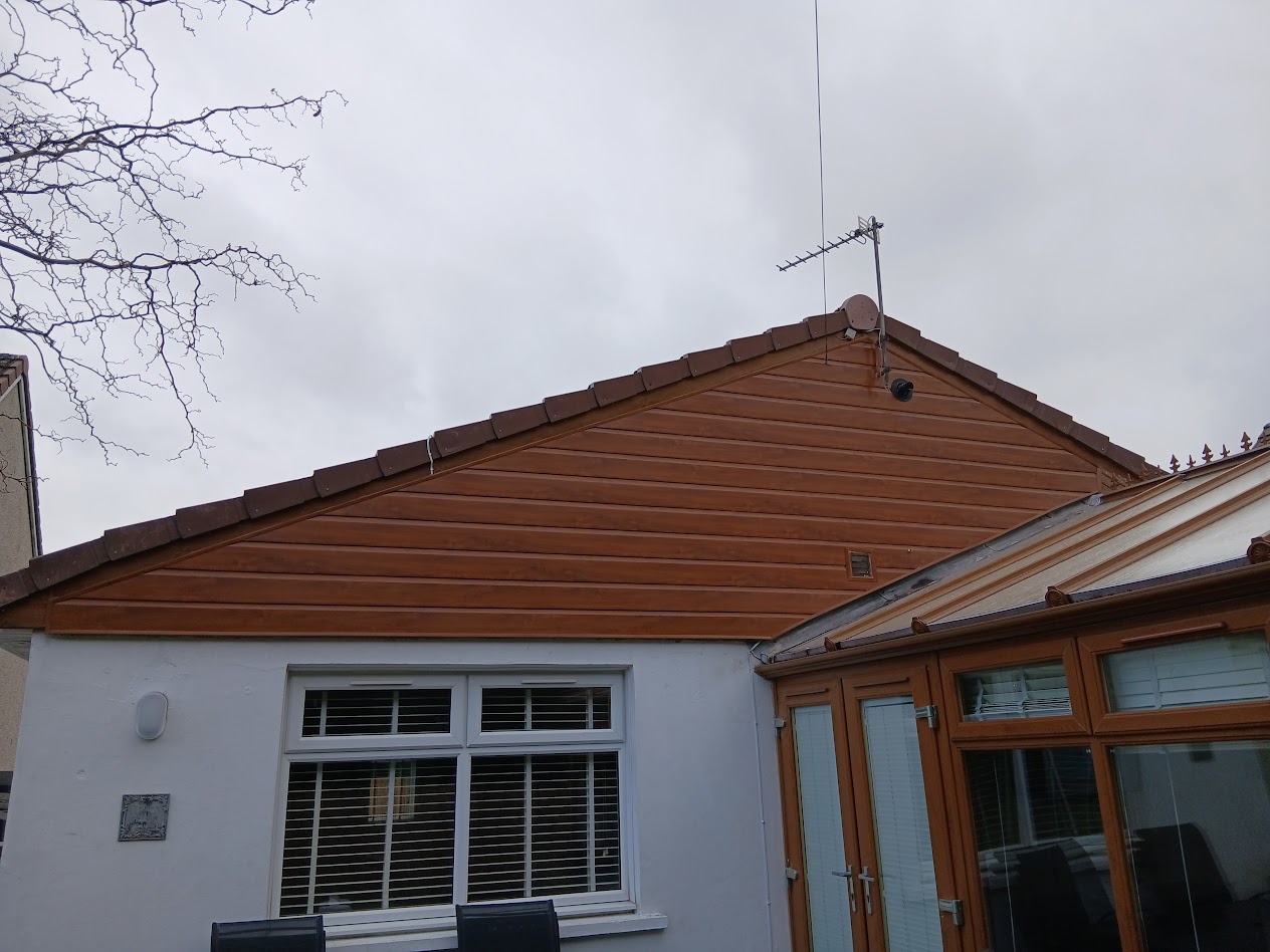 Timber cladding gable end with tiled roof by Woodgate Joinery Glasgow
