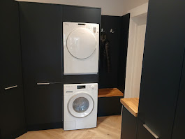 Bespoke utility room stacked washer dryer housing by Woodgate Joinery Glasgow