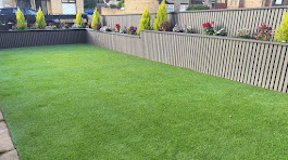 Artificial turf lawn with timber fence by Woodgate Joinery Glasgow