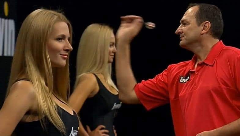 Graham Filby throwing darts on the PDC World Cup stage