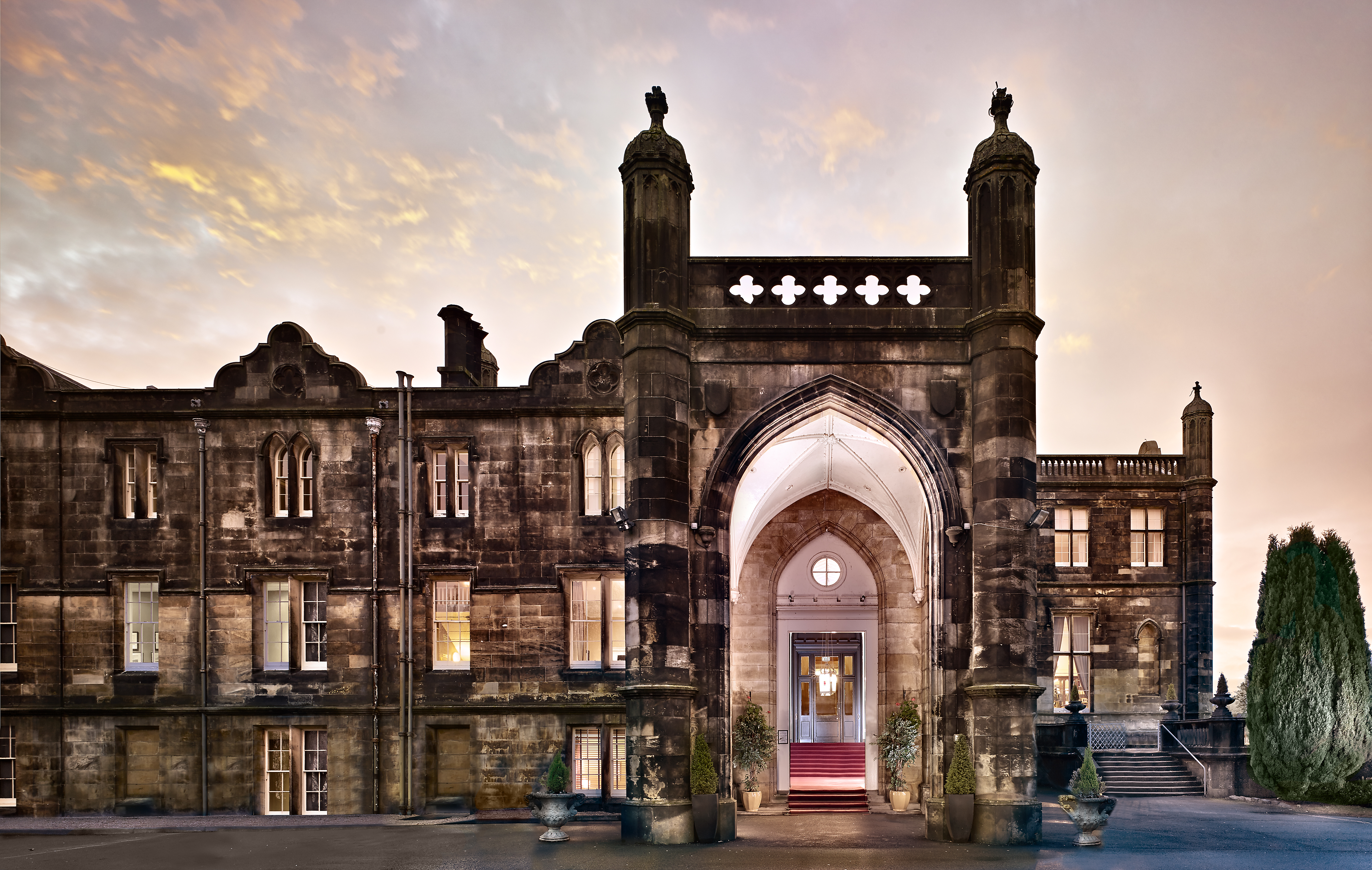 Mar Hall Golf and Spa Resort front of hotel — grand Edwardian mansion with Gothic arch entrance, 5-star corporate event venue near Glasgow Airport