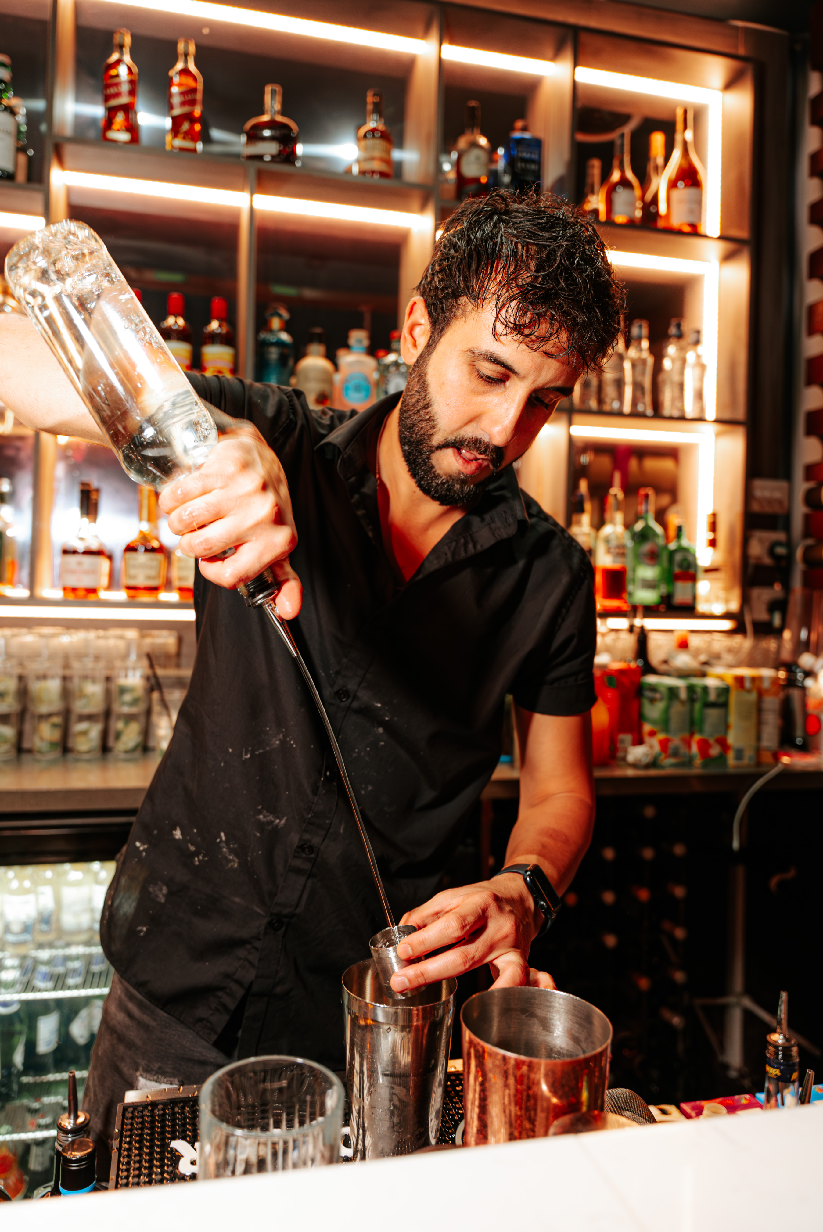 Bartender crafting cocktails