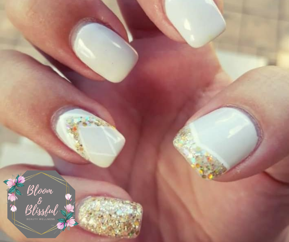 White nails with gold glitter chevron and confetti accent by Emmie