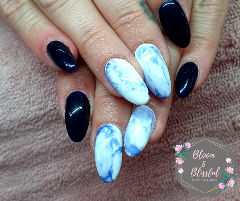 Navy blue and white marble almond nails by Emmie