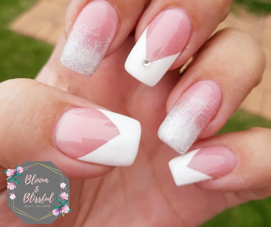 V-shaped French tip nails with silver glitter ombre and crystal by Emmie