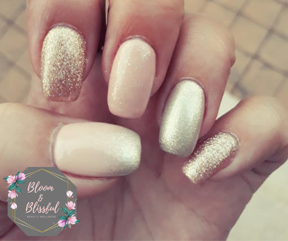 Nude and champagne gold shimmer nails with glitter ombre by Emmie