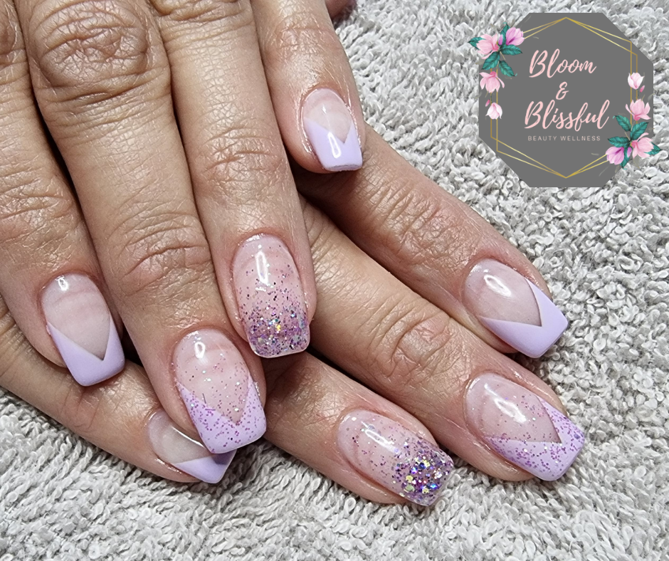 Lavender V-tip French nails with purple glitter ombre accent by Emmie