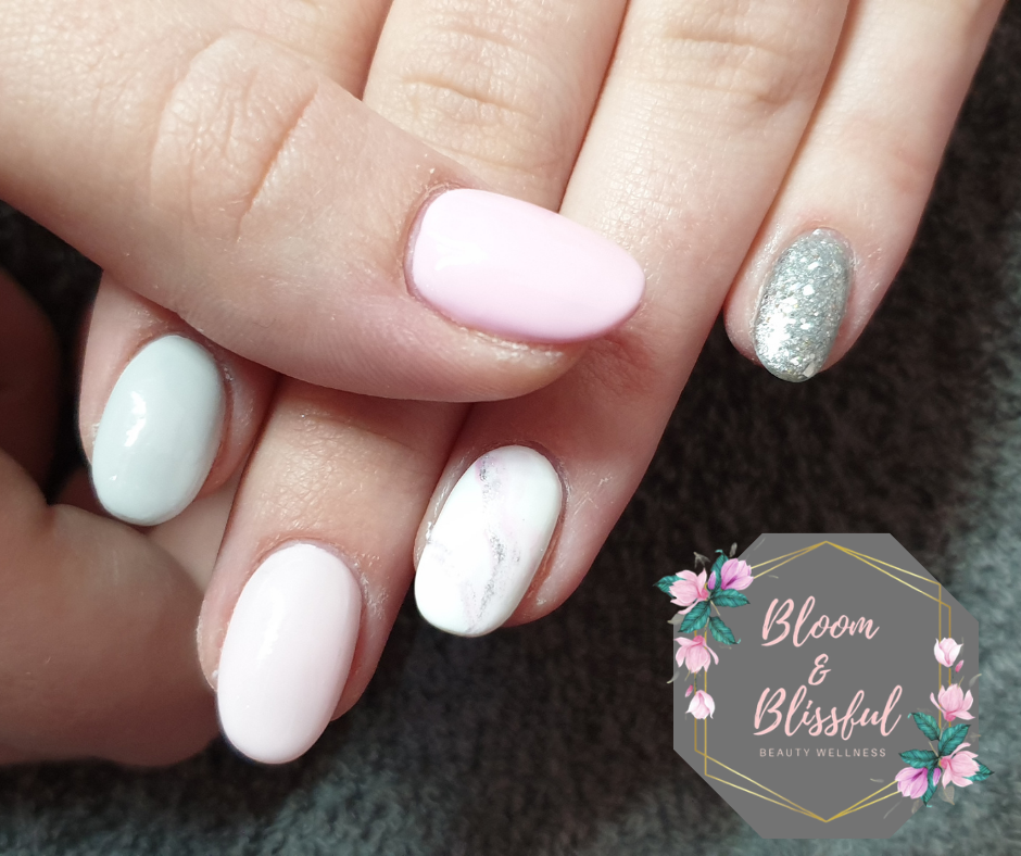 Pastel pink mint and silver glitter nails with marble accent by Emmie