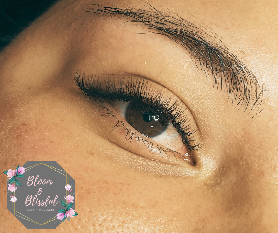 Classic lash extensions close-up with natural wispy finish by Emmie