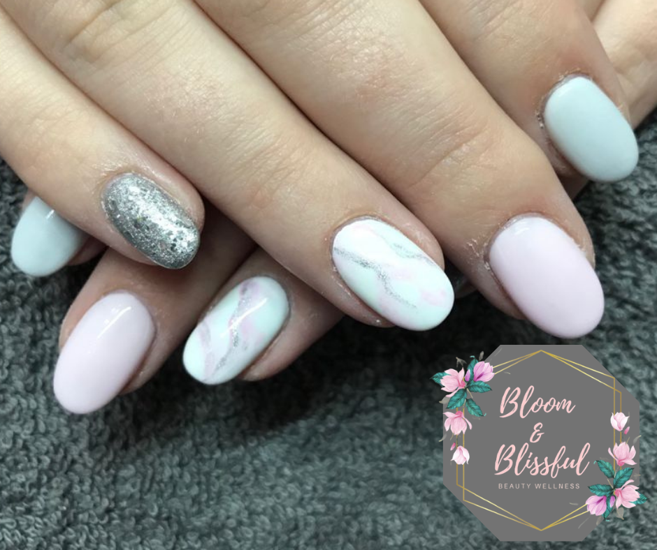 Mint and pink marble nails with silver glitter accent by Emmie
