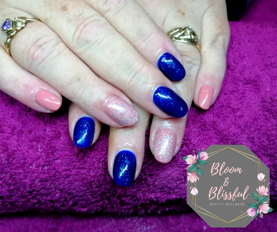 Royal blue glitter nails with rose gold shimmer by Emmie