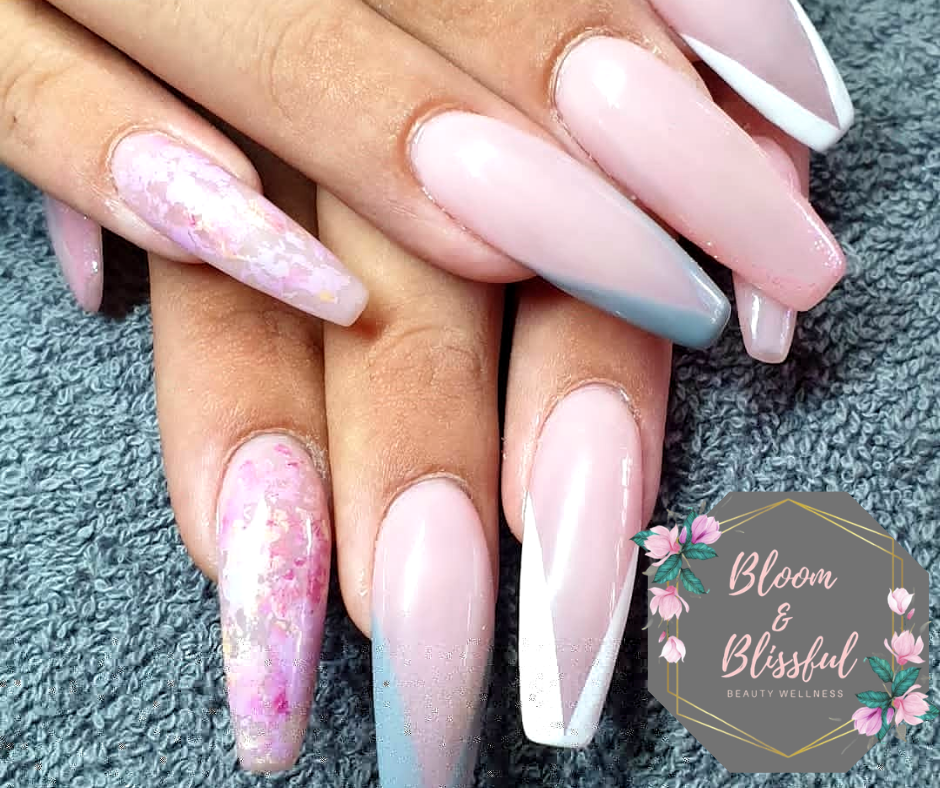 Pink coffin nails with marble floral accent by Emmie