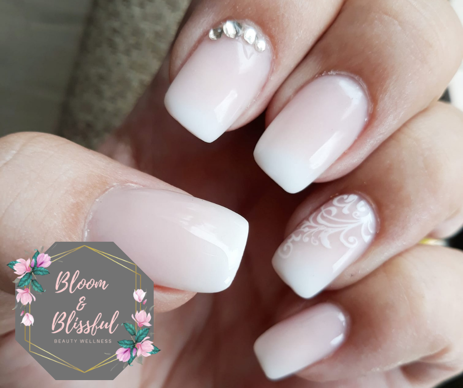 Soft pink ombre nails with lace detail and crystals by Emmie
