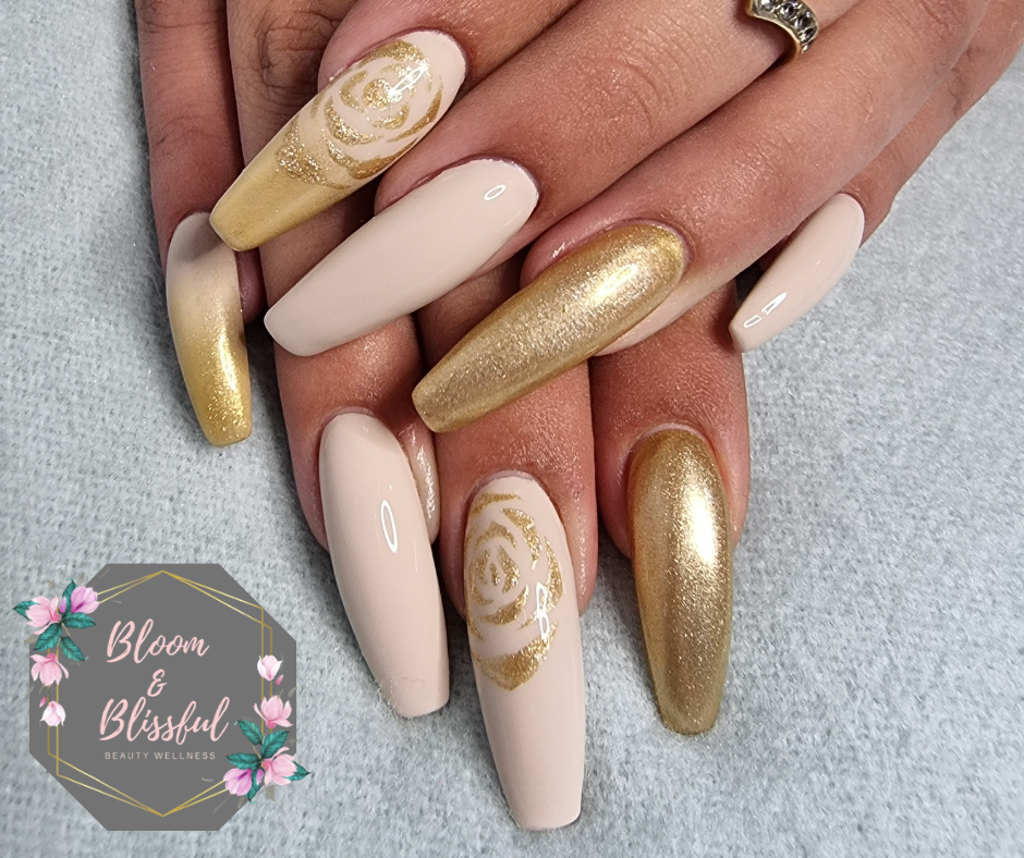 Nude and gold chrome coffin nails with glitter rose art by Emmie