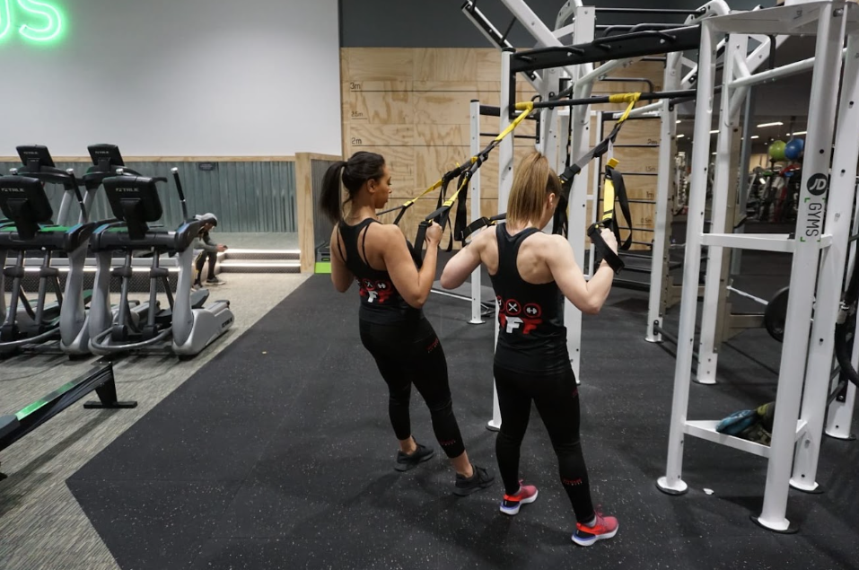 Fit Fast Academy students training in the gym