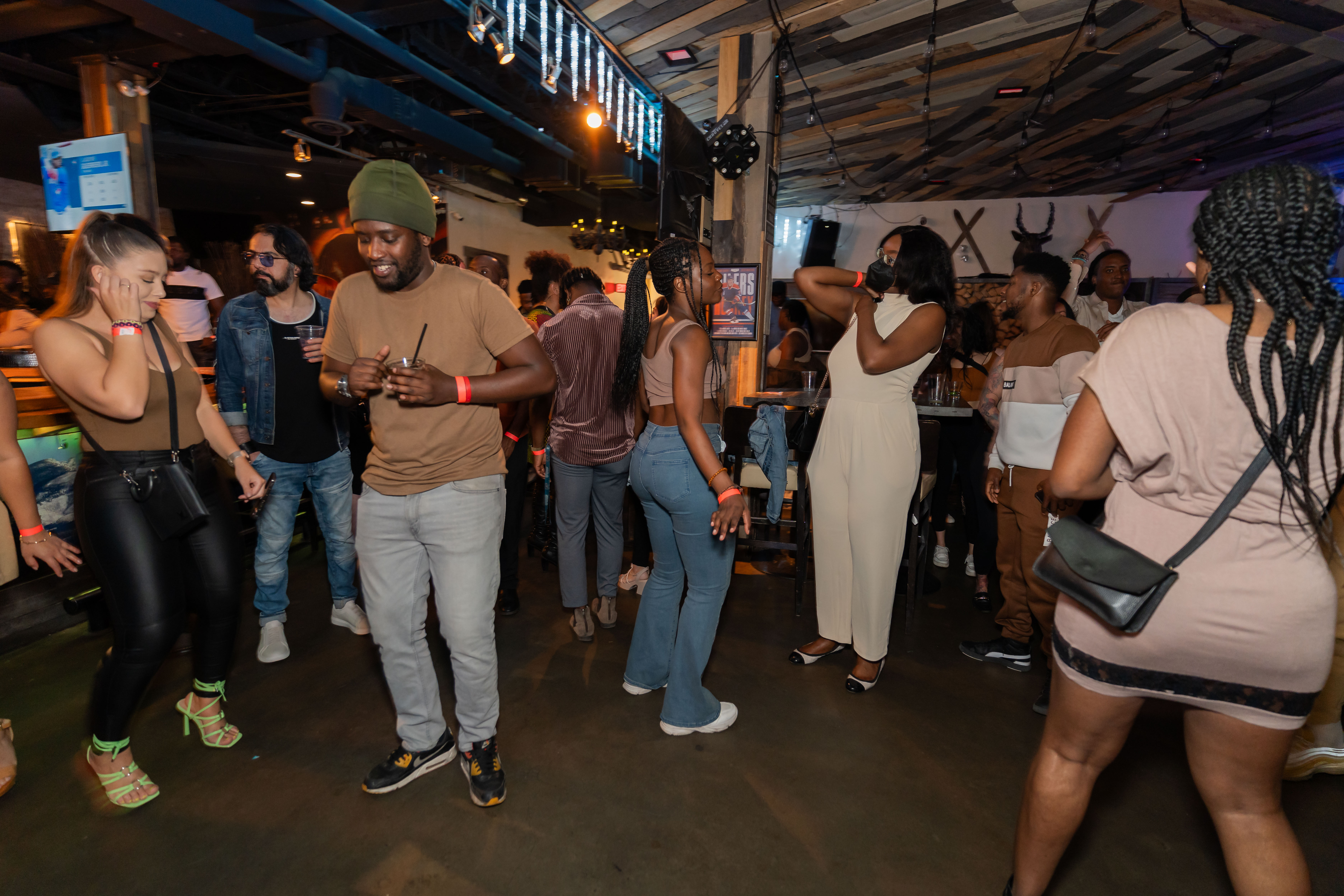 Guests dancing at a La Connexional event in Edmonton