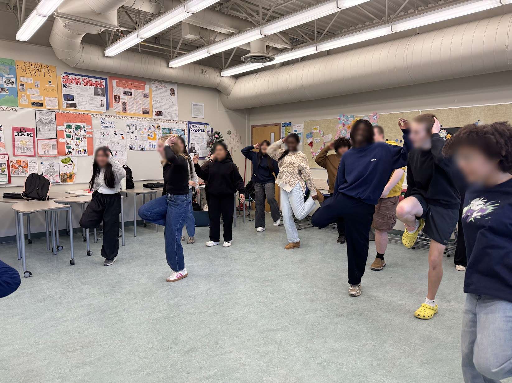 Students grooving together during a Groove Culture workshop session in a classroom