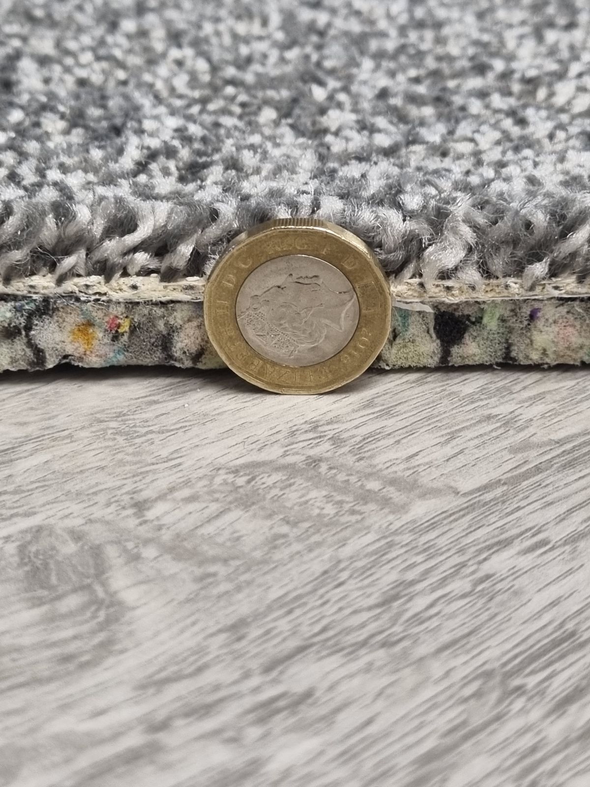 Close-up of thick carpet underlay showing depth and quality